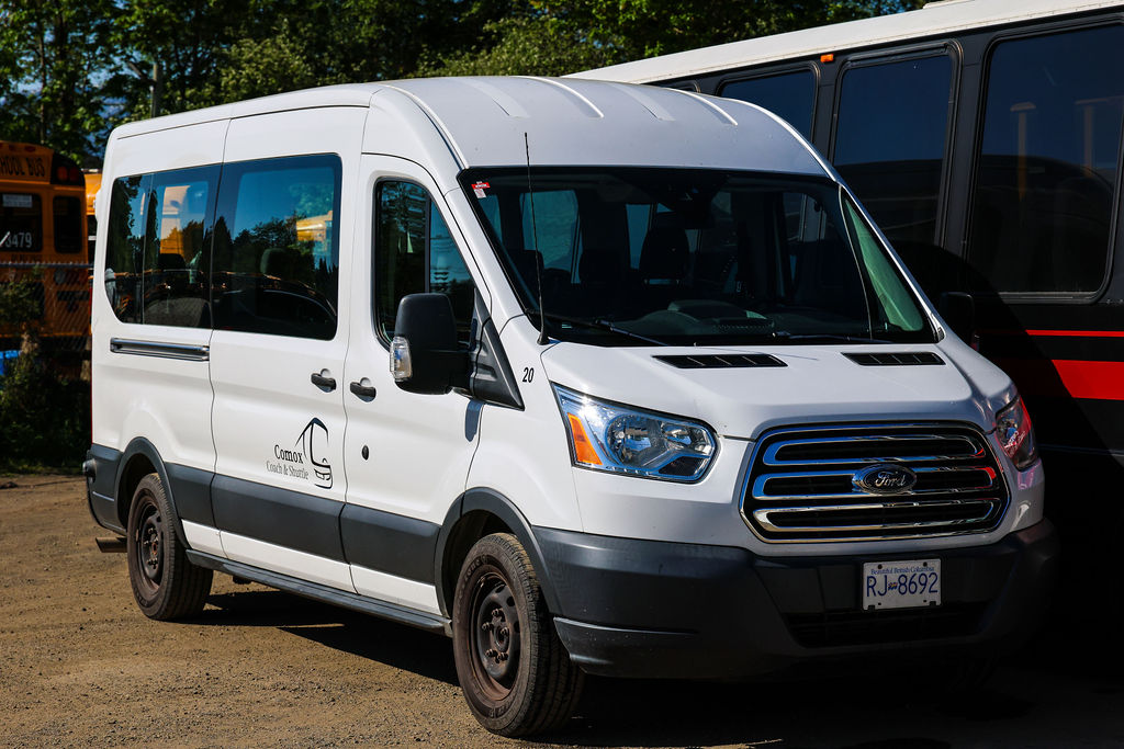 Comox Coach & Shuttle Ford Transit passenger van